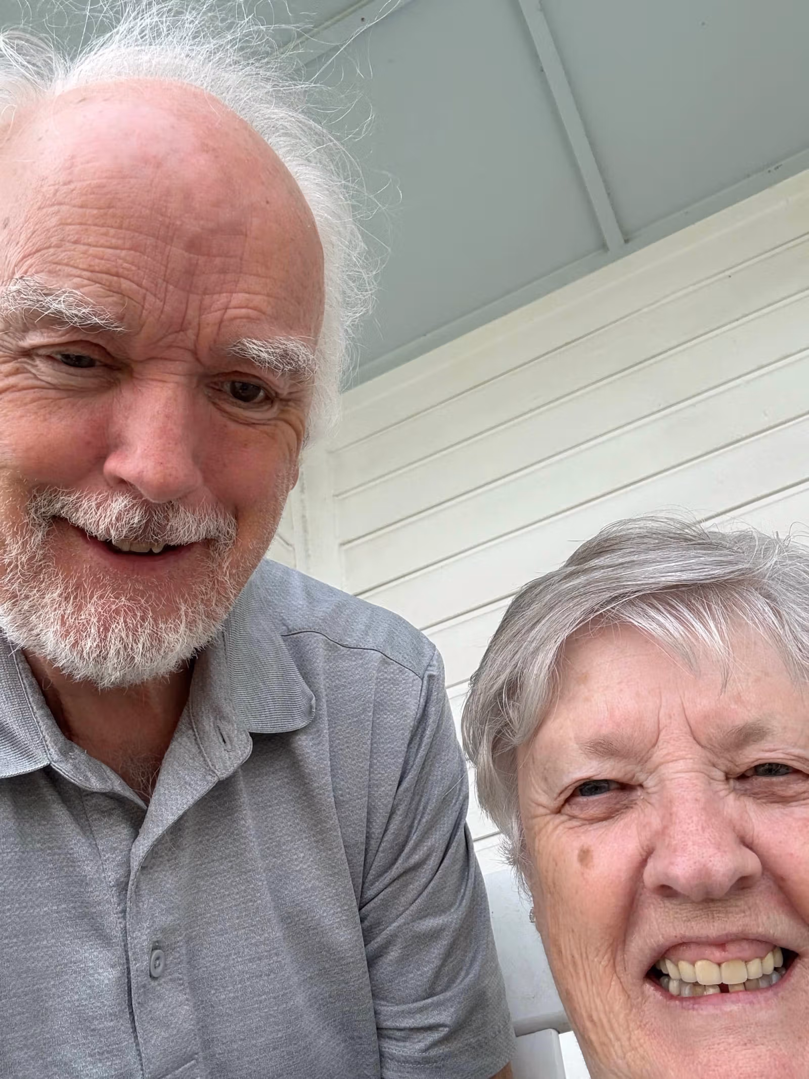Older couple taking a selfie during Alan's Function story feature.
